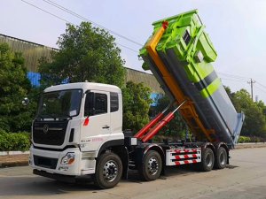 勾臂式垃圾車報(bào)道-重汽28噸多功能拉臂車